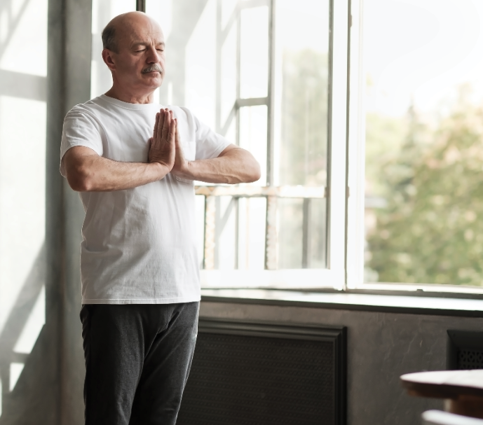 Older adult doing yoga